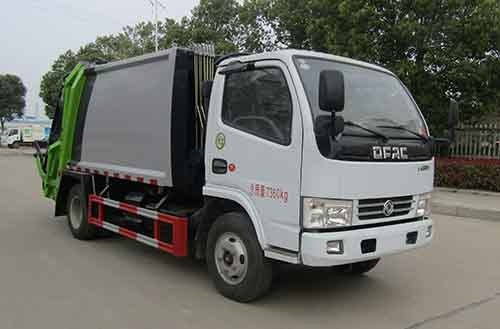 बंद कंटेनर के साथ 4X2 129hp कचरा डंप ट्रक 7360 किग्रा